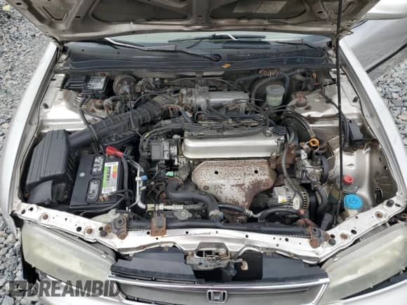 1997 Honda Accord LX с VIN 1HGCD7230VA027915, выставлен на аукционе Copart как лот 58961425 с пробегом 200 814 миль миль и Списание • Salvage title. История ставок и продаж доступна на DreamBid. Изображение 11.