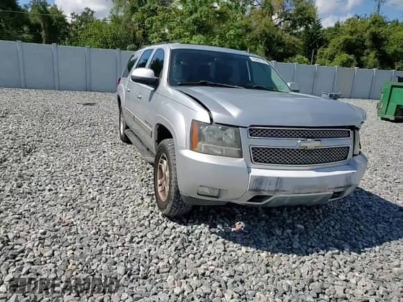 2011 Chevrolet Suburban LT with VIN 1GNSCJE0XBR166076, listed as a Copart auction lot 85882165 with 169,114 mi miles and Salvage title. Bid and sale history available at DreamBid. Image 14.