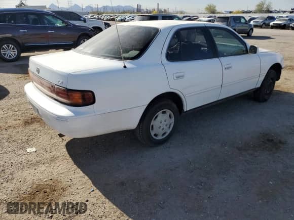 1992 Toyota Camry LE с VIN 4T1SK12E0NU064956, выставлен на аукционе Copart как лот 50665925 с пробегом 228 909 миль миль и Списание • Salvage title. История ставок и продаж доступна на DreamBid. Изображение 3.