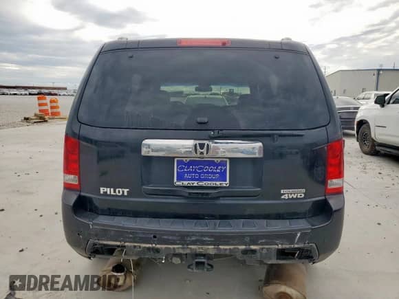2009 Honda Pilot Touring with VIN 5FNYF48809B035719, listed as a Copart auction lot 63201775 with 202,385 mi miles and Salvage title. Bid and sale history available at DreamBid. Image 6.