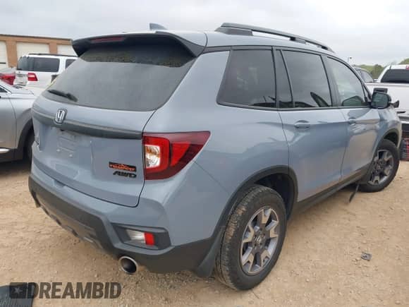 2023 Honda Passport TrailSport с VIN 5FNYF8H66PB032309, выставлен на аукционе IAAI как лот 41955503 с пробегом 29 278 миль миль и . История ставок и продаж доступна на DreamBid. Изображение 4.