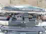 2005 Ford Econoline Cargo with VIN 1FTRE14W45HA26624, listed as a IAAI auction lot 42787243 with 490,973 mi miles and . Bid and sale history available at DreamBid. Image 10.