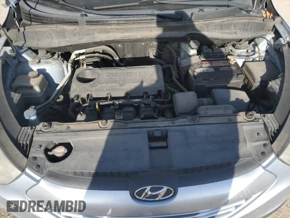 2011 Hyundai Tucson Limited with VIN KM8JU3AC7BU213263, listed as a Copart auction lot 52646455 with 165,236 mi miles and Salvage title. Bid and sale history available at DreamBid. Image 12.