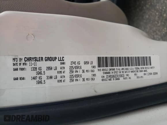 2012 Dodge Grand Caravan American Value with VIN 2C4RDGBG2CR193633, listed as a Copart auction lot 67349305 with 241,908 mi miles and Salvage title. Bid and sale history available at DreamBid. Image 13.