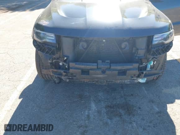 2016 Jeep Grand Cherokee SRT with VIN 1C4RJFDJ8GC306401, listed as a IAAI auction lot 42782259 with 116,318 mi miles and . Bid and sale history available at DreamBid. Image 6.