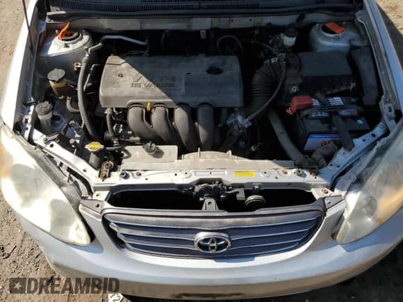 2003 Toyota Corolla CE с VIN JTDBR32E932004534, выставлен на аукционе Copart как лот 70568175 с пробегом 93 585 миль миль и Списание • Salvage title. История ставок и продаж доступна на DreamBid. Изображение 11.