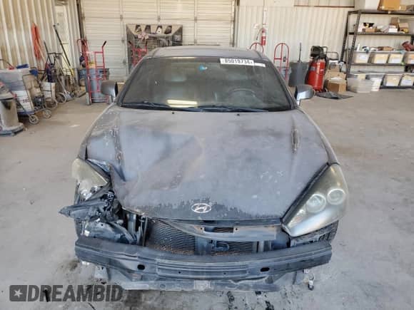 2007 Hyundai Tiburon GT с VIN KMHHN66F47U253212, выставлен на аукционе Copart как лот 85019734 с пробегом 200 172 миль миль и Списание • Salvage title. История ставок и продаж доступна на DreamBid. Изображение 5.