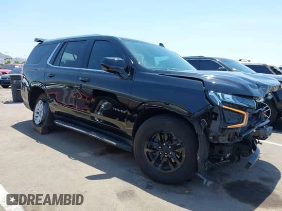 2021 Chevrolet Tahoe LT with VIN 1GNSCNKD5MR263476, listed as a IAAI auction lot 42476434 with 87,770 mi miles and . Bid and sale history available at DreamBid. Image 1.
