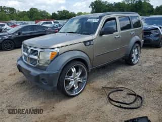 2007 Dodge Nitro SXT with VIN 1D8GT28K47W606529, listed as a Copart auction lot 54737475 with 176,695 mi miles and Salvage title. Bid and sale history available at DreamBid. Image 1.