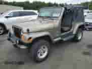 2004 Jeep Wrangler Sahara с VIN 1J4FA59S84P801582, выставлен на аукционе Copart как лот 64183535 с пробегом 127 213 миль миль и Списание • Salvage title. История ставок и продаж доступна на DreamBid. Изображение 1.