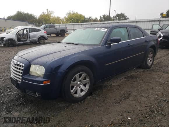 2006 Chrysler 300 Touring with VIN 2C3KA53G56H497843, listed as a Copart auction lot 85123995 with 157,853 mi miles and Salvage title. Bid and sale history available at DreamBid. Image 1.
