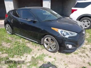 2013 Hyundai Veloster Turbo с VIN KMHTC6AE7DU124293, выставлен на аукционе IAAI как лот 41924836 с пробегом 141 685 миль миль и . История ставок и продаж доступна на DreamBid. Изображение 1.