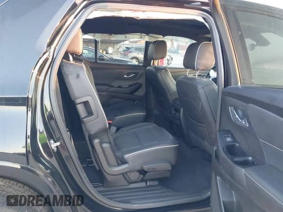 2023 Chevrolet Traverse Premier with VIN 1GNERKKW7PJ207358, listed as a IAAI auction lot 43186771 with 69,658 mi miles and . Bid and sale history available at DreamBid. Image 8.