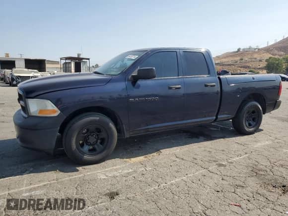 2012 Ram 1500 Tradesman с VIN 1C6RD6FPXCS253832, выставлен на аукционе Copart как лот 64153714 с пробегом 246 212 миль миль и Списание • Salvage title. История ставок и продаж доступна на DreamBid. Изображение 1.