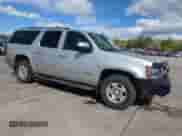 2011 Chevrolet Suburban LT z VIN 1GNSKJE32BR306182, wystawiony jako Copart lot #57253975 z przebiegiem 126 490 mil mil oraz Szkoda całkowita • Salvage title. Historia ofert i sprzedaży dostępna na DreamBid. Obrazek 4.