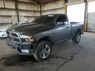 2012 Ram 1500 Express с VIN 3C6JD7ATXCG271150, выставлен на аукционе Copart как лот 52627305 с пробегом 78 311 миль миль и Списание • Salvage title. История ставок и продаж доступна на DreamBid. Изображение 1.