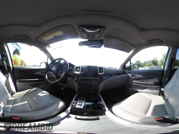 2017 Honda Pilot Touring with VIN 5FNYF6H92HB037071, listed as a IAAI auction lot 42613034 with 63,414 mi miles and . Bid and sale history available at DreamBid. Image 21.