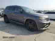 2015 Jeep Grand Cherokee High Altitude z VIN 1C4RJECG2FC144246, wystawiony jako Copart lot #64394565 z przebiegiem 126 730 mil mil oraz Szkoda całkowita • Salvage title. Historia ofert i sprzedaży dostępna na DreamBid. Obrazek 4.