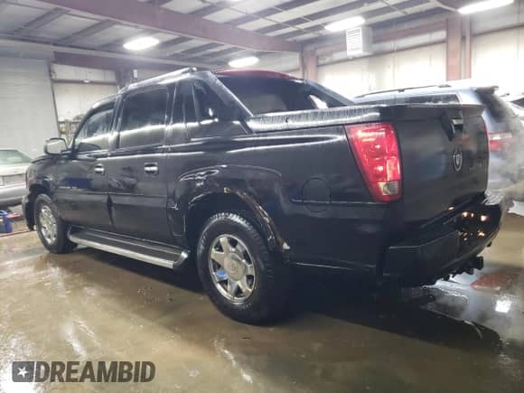 2003 Cadillac Escalade EXT with VIN 3GYEK63N33G118001, listed as a Copart auction lot 86897574 with 223,953 mi miles and Salvage title. Bid and sale history available at DreamBid. Image 2.