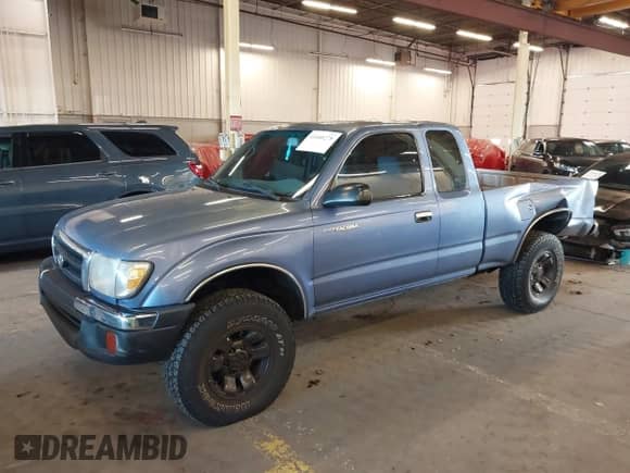 2000 Toyota Tacoma with VIN 4TAWM72N5YZ650056, listed as a IAAI auction lot 41680278 with 257,819 mi miles and . Bid and sale history available at DreamBid. Image 2.