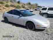 2001 Saturn SC с VIN 1G8ZP12891Z219977, выставлен на аукционе Copart как лот 60248255 с пробегом 230 514 миль миль и Списание • Salvage title. История ставок и продаж доступна на DreamBid. Изображение 4.