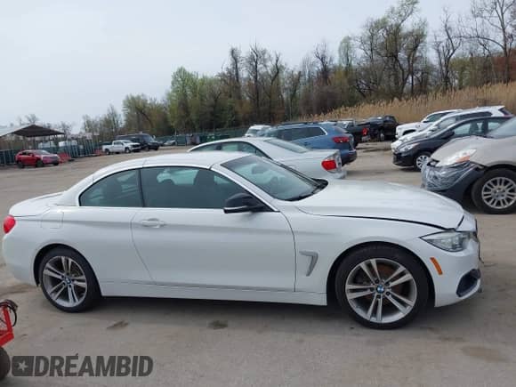 2014 BMW 4 Series 428i xDrive with VIN WBA3V9C56EPR69436, listed as a IAAI auction lot 41951778 with 169,085 mi miles and . Bid and sale history available at DreamBid. Image 13.