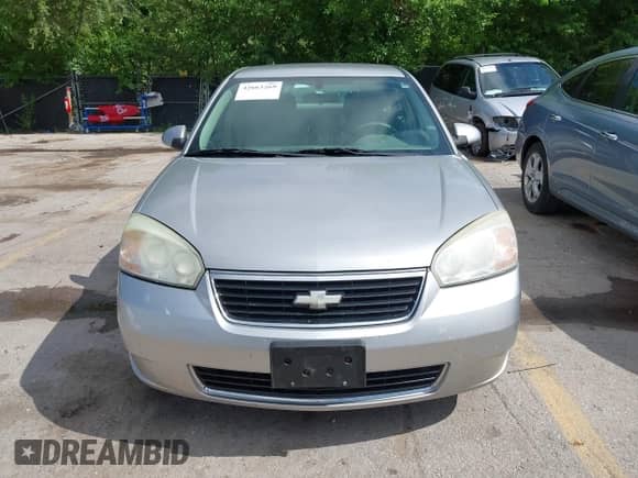 2006 Chevrolet Malibu Maxx LT z VIN 1G1ZT61866F102276, wystawiony jako IAAI lot #42663269 z przebiegiem 99 008 mil mil oraz . Historia ofert i sprzedaży dostępna na DreamBid. Obrazek 6.