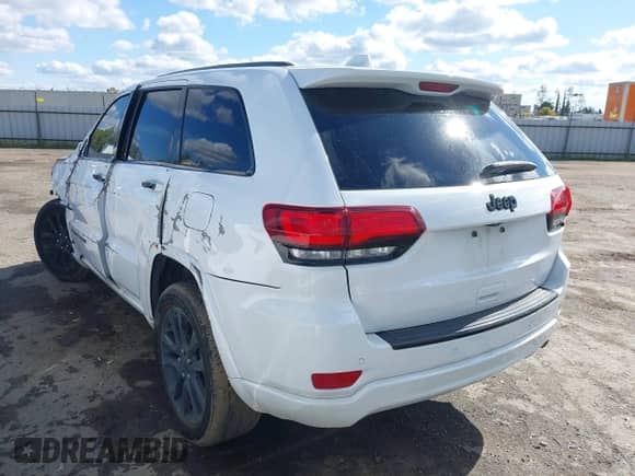 2018 Jeep Grand Cherokee Laredo E with VIN 1C4RJEAG4JC193539, listed as a IAAI auction lot 41827154 with 79,784 mi miles and . Bid and sale history available at DreamBid. Image 3.