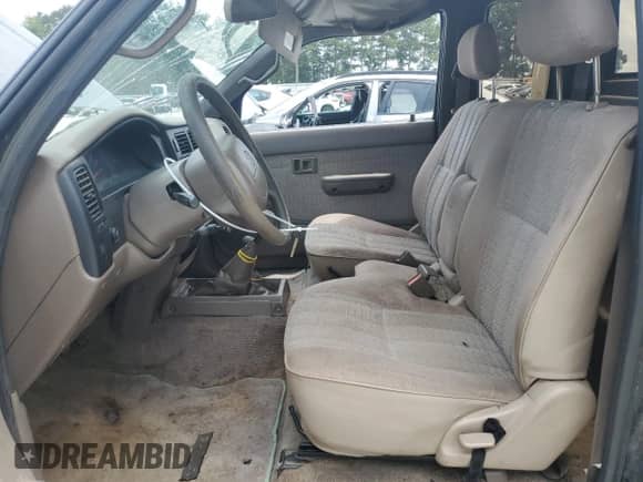 1997 Toyota Tacoma z VIN 4TAWN72N7VZ241873, wystawiony jako Copart lot #68393535 z przebiegiem 216 059 mil mil oraz Szkoda całkowita • Salvage title. Historia ofert i sprzedaży dostępna na DreamBid. Obrazek 7.