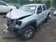 2009 Toyota Tacoma PreRunner z VIN 3TMJU62N99M077383, wystawiony jako IAAI lot #42670811 z przebiegiem 168 908 mil mil oraz . Historia ofert i sprzedaży dostępna na DreamBid. Obrazek 2.