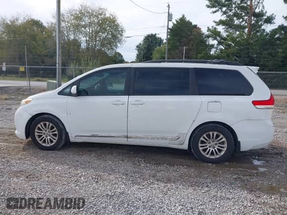 2012 Toyota Sienna XLE with VIN 5TDYK3DC4CS231407, listed as a IAAI auction lot 43531271 with 382,802 mi miles and . Bid and sale history available at DreamBid. Image 14.
