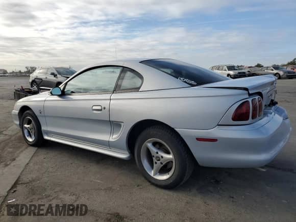 1996 Ford Mustang z VIN 1FALP4047TF106715, wystawiony jako Copart lot #78658044 z przebiegiem 60 205 mil mil oraz Szkoda całkowita • Salvage title. Historia ofert i sprzedaży dostępna na DreamBid. Obrazek 2.