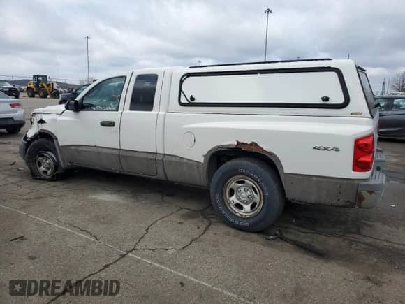 2008 Dodge Dakota z VIN 1D3HW22K18S638485, wystawiony jako Copart lot #86774214 z przebiegiem 189 304 mil mil oraz Szkoda całkowita • Salvage title. Historia ofert i sprzedaży dostępna na DreamBid. Obrazek 2.