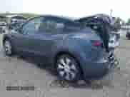 2023 Tesla Model Y Long Range z VIN 7SAYGDEE5PA208753, wystawiony jako IAAI lot #43211154 z przebiegiem 40 499 mil mil oraz . Historia ofert i sprzedaży dostępna na DreamBid. Obrazek 3.