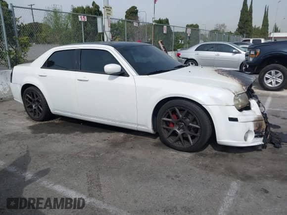2007 Chrysler 300 C SRT-8 with VIN 2C3LA73W17H659735, listed as a IAAI auction lot 41688198 with 132,785 mi miles and . Bid and sale history available at DreamBid. Image 13.
