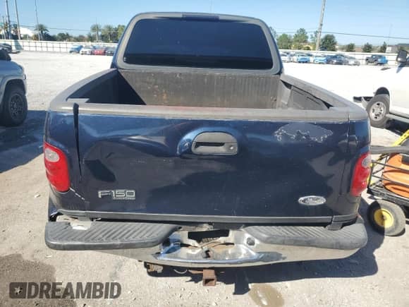 2003 Ford F-150 XLT z VIN 1FTRW076X3KA47075, wystawiony jako Copart lot #86305595 z przebiegiem 255 218 mil mil oraz Szkoda całkowita • Salvage title. Historia ofert i sprzedaży dostępna na DreamBid. Obrazek 6.