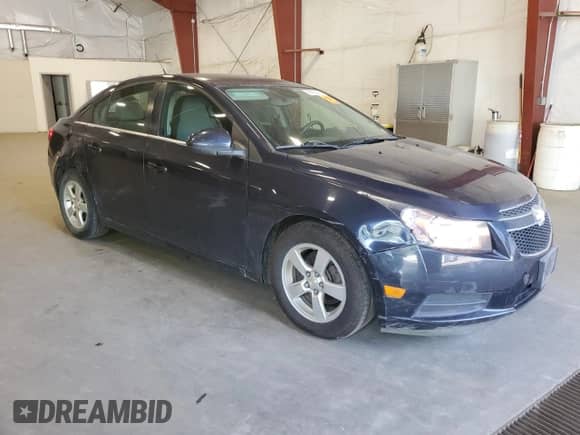 2014 Chevrolet Cruze 1LT with VIN 1G1PC5SB3E7398751, listed as a Copart auction lot 68300245 with 68,633 mi miles and Salvage title. Bid and sale history available at DreamBid. Image 4.