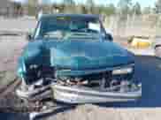 1996 GMC Sierra 1500 z VIN 2GTEC19R9T1541142, wystawiony jako IAAI lot #41375900 z przebiegiem 292 893 mil mil oraz . Historia ofert i sprzedaży dostępna na DreamBid. Obrazek 12.