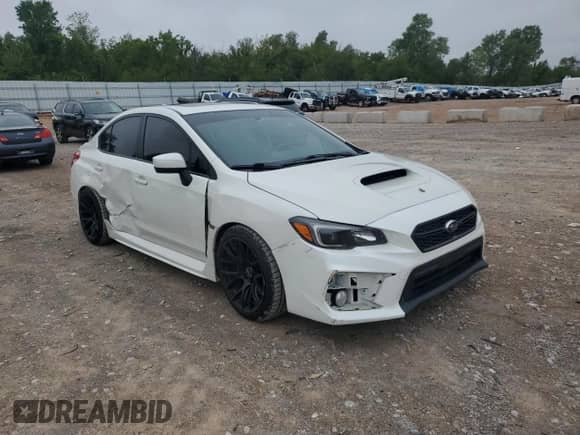 2020 Subaru WRX Premium with VIN JF1VA1C62L9814875, listed as a Copart auction lot 70986585 with 76,047 mi miles and Salvage title. Bid and sale history available at DreamBid. Image 4.