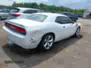 2014 Dodge Challenger R/T z VIN 2C3CDYBT4EH116686, wystawiony jako IAAI lot #42632477 z przebiegiem 119 074 mil mil oraz . Historia ofert i sprzedaży dostępna na DreamBid. Obrazek 4.