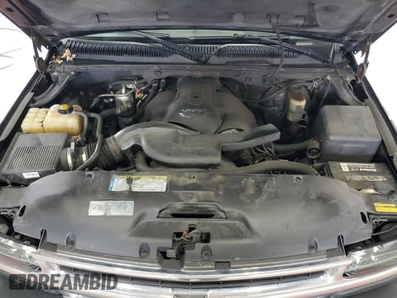 2001 Chevrolet Suburban LT z VIN 3GNFK16T21G242868, wystawiony jako Copart lot #73703894 z przebiegiem 359 694 mil mil oraz Szkoda całkowita • Salvage title. Historia ofert i sprzedaży dostępna na DreamBid. Obrazek 12.