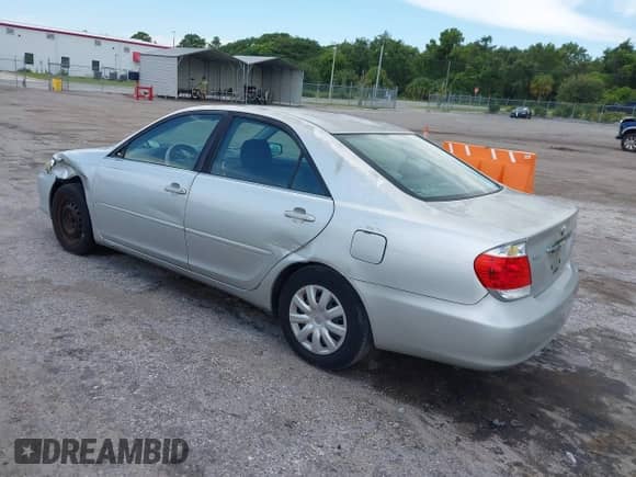 2005 Toyota Camry STD with VIN 4T1BE32K85U974198, listed as a IAAI auction lot 42879062 with 269,935 mi miles and . Bid and sale history available at DreamBid. Image 3.
