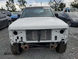 1991 Chevrolet Blazer z VIN 1GNCT18Z5M8105497, wystawiony jako Copart lot #65277335 z przebiegiem 156 219 mil mil oraz Szkoda całkowita • Salvage title. Historia ofert i sprzedaży dostępna na DreamBid. Obrazek 5.