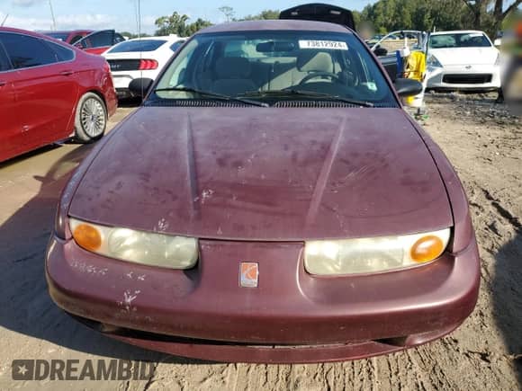 2001 Saturn SL with VIN 1G8ZK52711Z324512, listed as a Copart auction lot 73812924 with 121,284 mi miles and Salvage title. Bid and sale history available at DreamBid. Image 5.