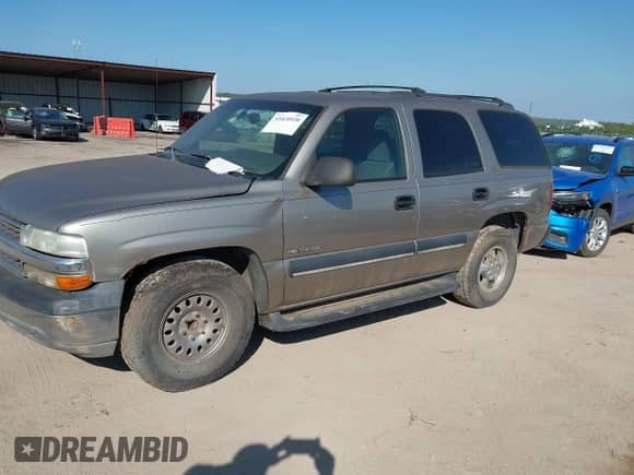 2002 Chevrolet Tahoe LS with VIN 1GNEC13Z42R257746, listed as a IAAI auction lot 43420920 with 255,761 mi miles and . Bid and sale history available at DreamBid. Image 15.