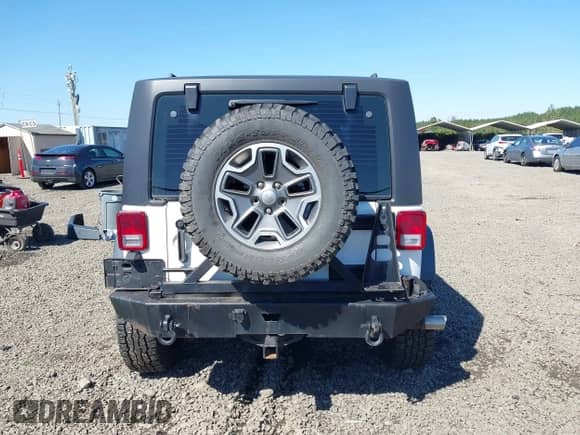 2013 Jeep Wrangler Rubicon with VIN 1C4HJWCG7DL559674, listed as a IAAI auction lot 43228071 with 132,155 mi miles and . Bid and sale history available at DreamBid. Image 17.