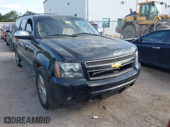 2014 Chevrolet Suburban LTZ with VIN 1GNSCKE08ER220808, listed as a IAAI auction lot 42022477 with 192,488 mi miles and . Bid and sale history available at DreamBid. Image 1.