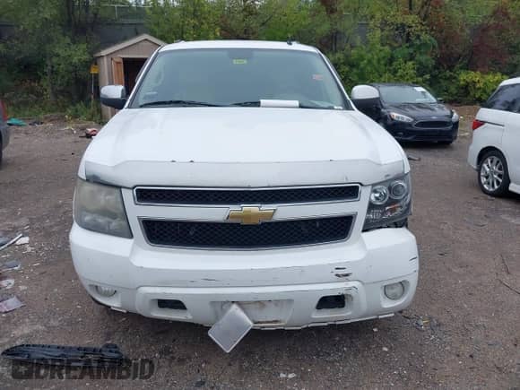 2010 Chevrolet Suburban LT with VIN 1GNUKJE32AR113764, listed as a IAAI auction lot 43277102 with 297,432 mi miles and . Bid and sale history available at DreamBid. Image 12.