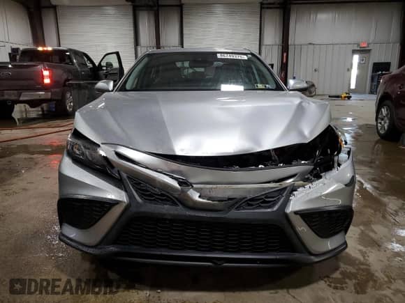 2023 Toyota Camry SE z VIN 4T1S11AK2PU736173, wystawiony jako Copart lot #86749375 z przebiegiem 26 763 mil mil oraz Szkoda całkowita • Salvage title. Historia ofert i sprzedaży dostępna na DreamBid. Obrazek 5.