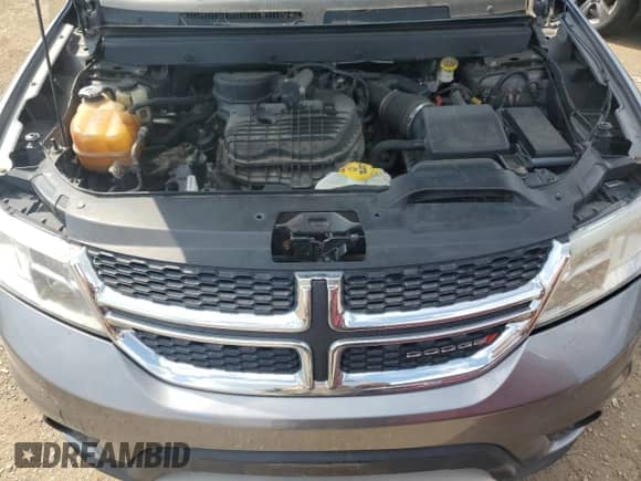 2012 Dodge Journey Crew with VIN 3C4PDCDG1CT204552, listed as a Copart auction lot 66494005 with 145,067 mi miles and Salvage title. Bid and sale history available at DreamBid. Image 11.